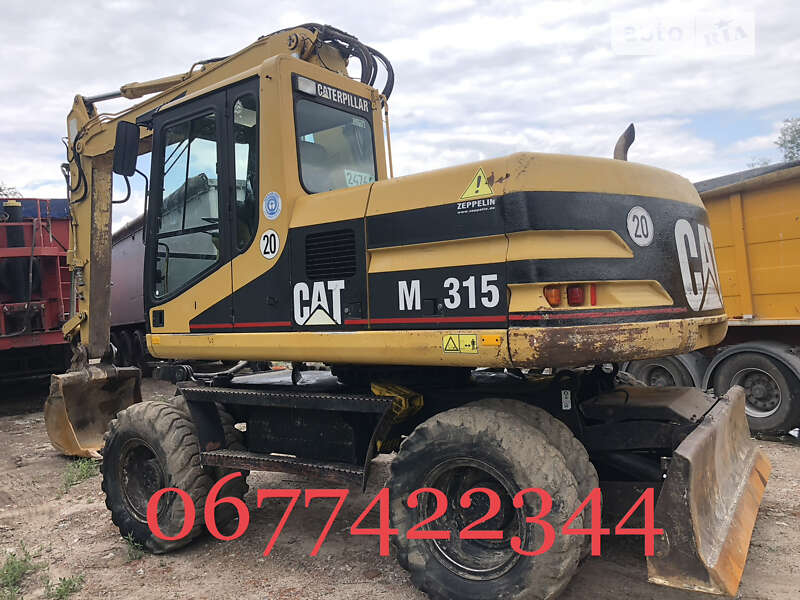 Колесный экскаватор Caterpillar 315 2001 в Львове Колесный экскаватор Caterpillar 315 2001 в Львове