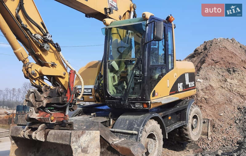 Колесный экскаватор Caterpillar 315 2006 в Львове