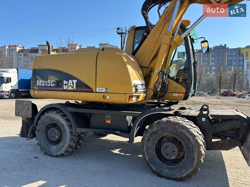 Колесный экскаватор Caterpillar 315 2006 в Львове