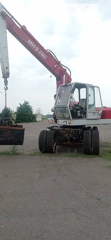Екскаватор навантажувач O&K MH 5 1993 в Чинадієвому