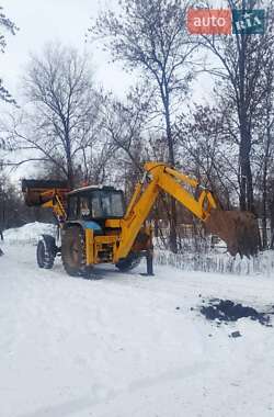 Екскаватор навантажувач Амкодор 702ЕМ-03 2009 в Кривому Розі