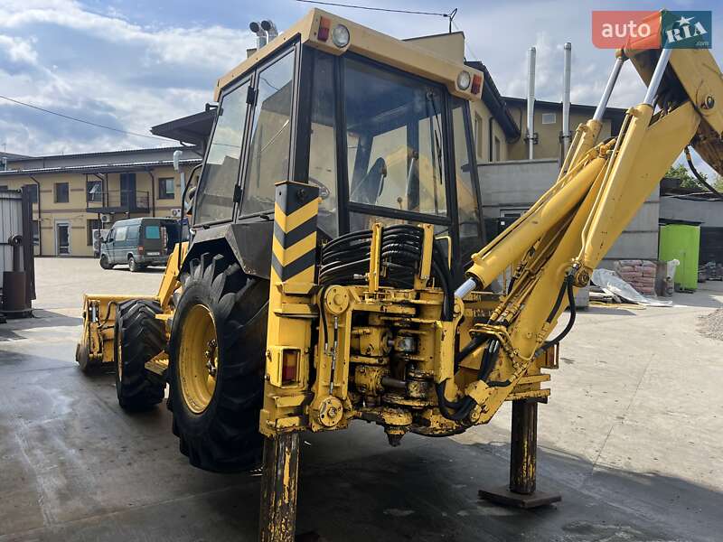 Экскаватор погрузчик АТЕК 999 1997 в Богуславе