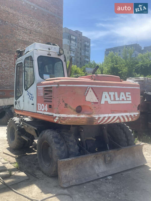 Колесный экскаватор Atlas 1304 1996 в Хмельницком
