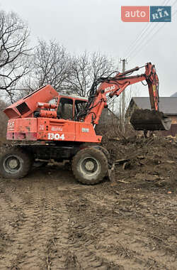 Экскаватор погрузчик Atlas 1304 1992 в Черновцах