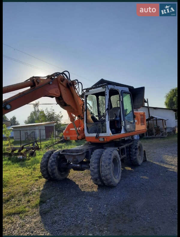 Экскаватор погрузчик Atlas 1404 1996 в Хусте