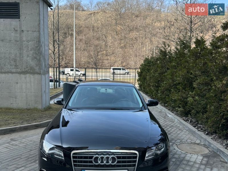 2011 Audi A4, VIN WAUBFCFLXBN043208:plate — фото 1 (autoria)