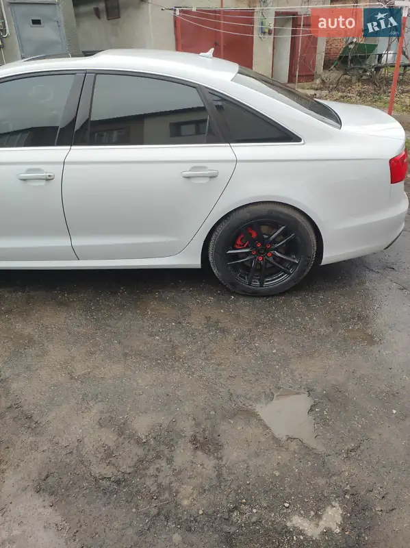 Audi A6 2014 VIN WAUFMAFC5FN029119 фото оголошення 12 з 87