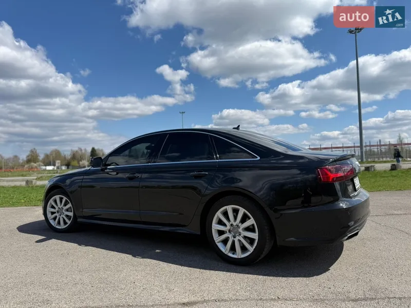 Audi A6 2015 VIN WAUGFAFC8GN007650 фото оголошення 2 з 89