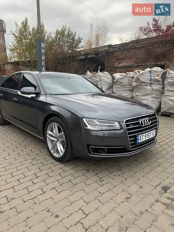 Audi A8 2013 VIN WAURGAFD2DN012434 фото оголошення 18 з 48