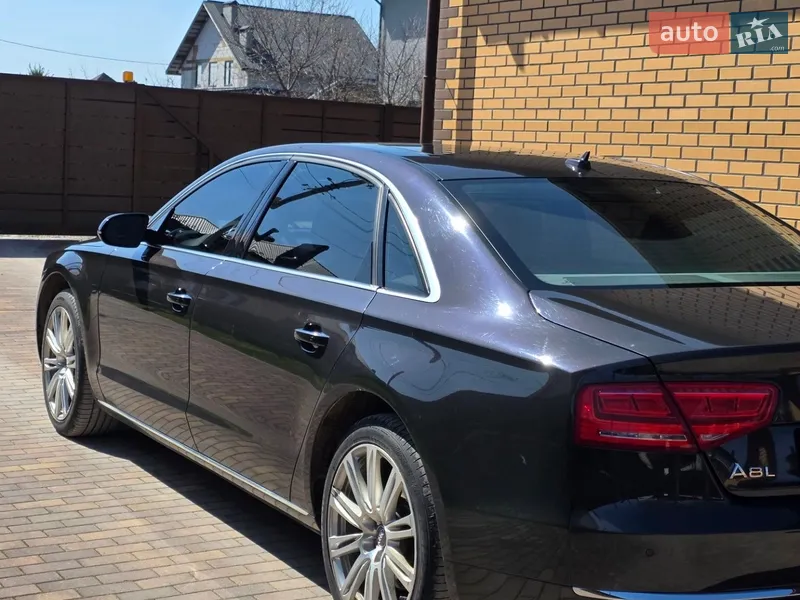 Audi A8 2013 VIN WAURGAFD2DN012434 фото оголошення 5 з 48