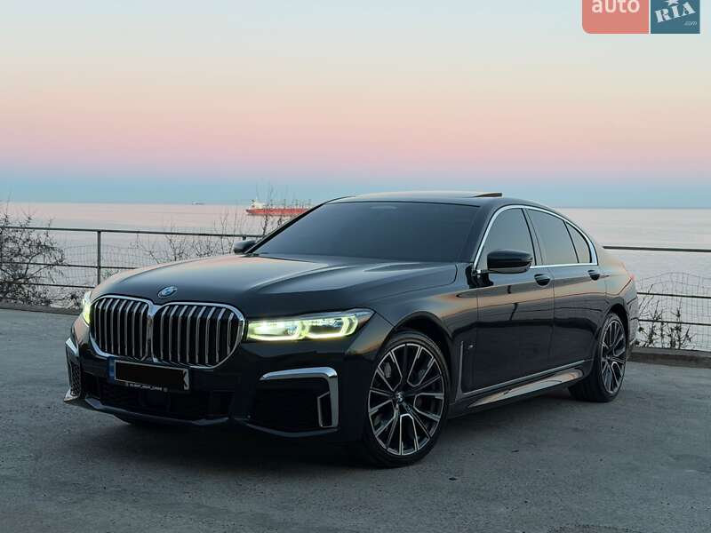 2019 BMW 7-Series, VIN WBA7S6104LCD21469:plate — фото 1 (autoria)