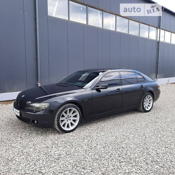 2006 BMW 730, VIN WBAHN21000DS86789:plate — photo 1 (autoria)