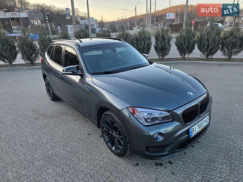 2014 BMW X1, VIN WBAVM5C51FVV93987:plate — фото 1 (autoria)