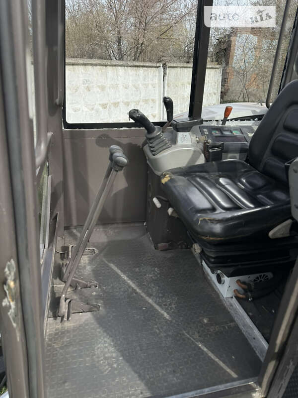 Экскаватор погрузчик Bobcat 334 2003 в Каменец-Подольском