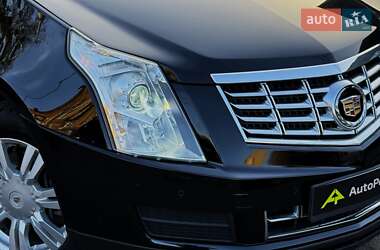 Позашляховик / Кросовер Cadillac SRX 2014 в 