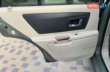 Позашляховик / Кросовер Cadillac SRX 2004 в 