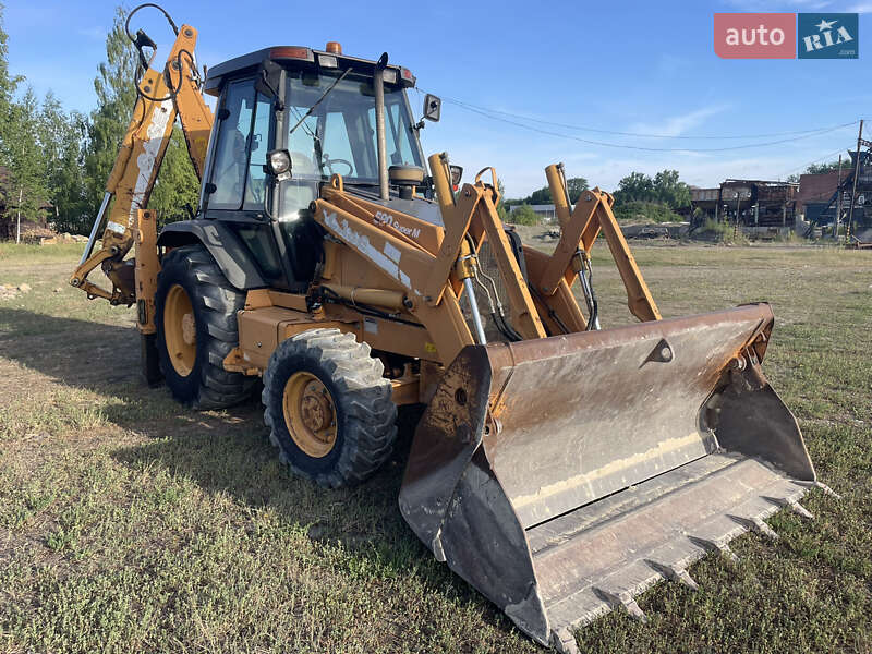 Экскаватор погрузчик Case Construction 590 SL 2003 в Калуше