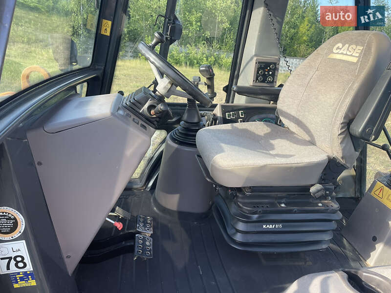 Экскаватор погрузчик Case Construction 590 SL 2003 в Калуше