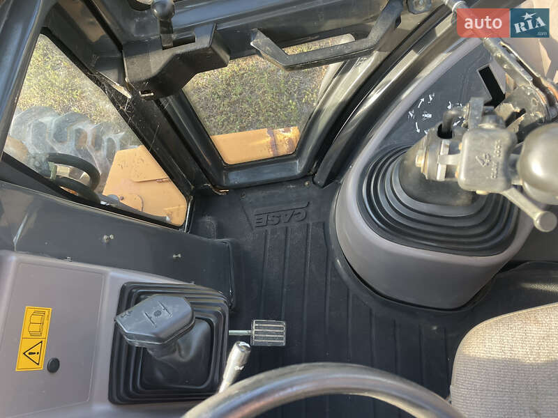 Экскаватор погрузчик Case Construction 590 SL 2003 в Калуше