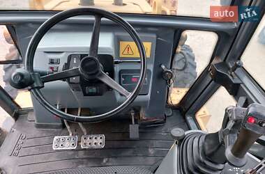 Экскаватор погрузчик Case Construction 590 SL 2001 в 