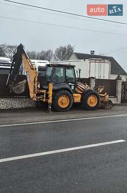Экскаватор погрузчик Case Construction 695 SR-4 PS 2010 в Кременце