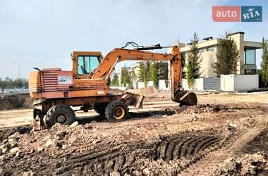 Экскаватор погрузчик Case Construction 695 ST 1994 в 