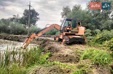 Экскаватор погрузчик Case Construction 695 ST 1994 в 