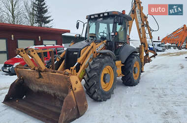 Экскаватор погрузчик Case Construction 695 ST 2009 в Одессе