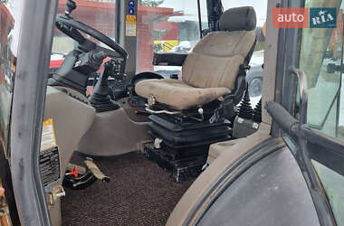Экскаватор погрузчик Case Construction 695 ST 2009 в Одессе