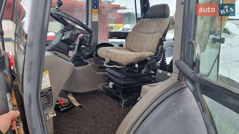 Экскаватор погрузчик Case Construction 695 ST 2009 в Одессе