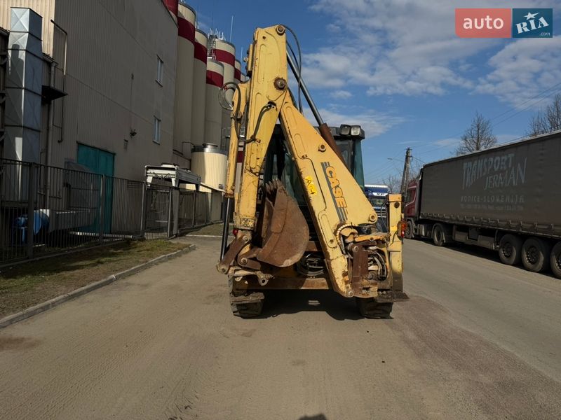 Экскаватор погрузчик Case Construction 695 ST 2002 в Радомышле