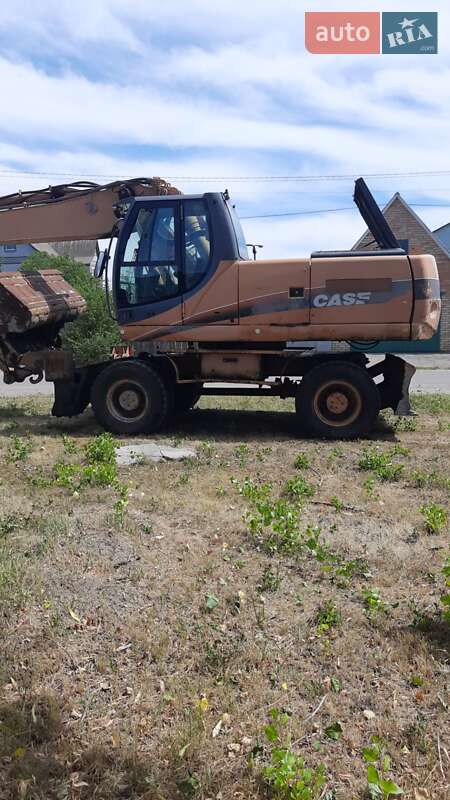 Колісний екскаватор Case Construction WX 210 2009 в 