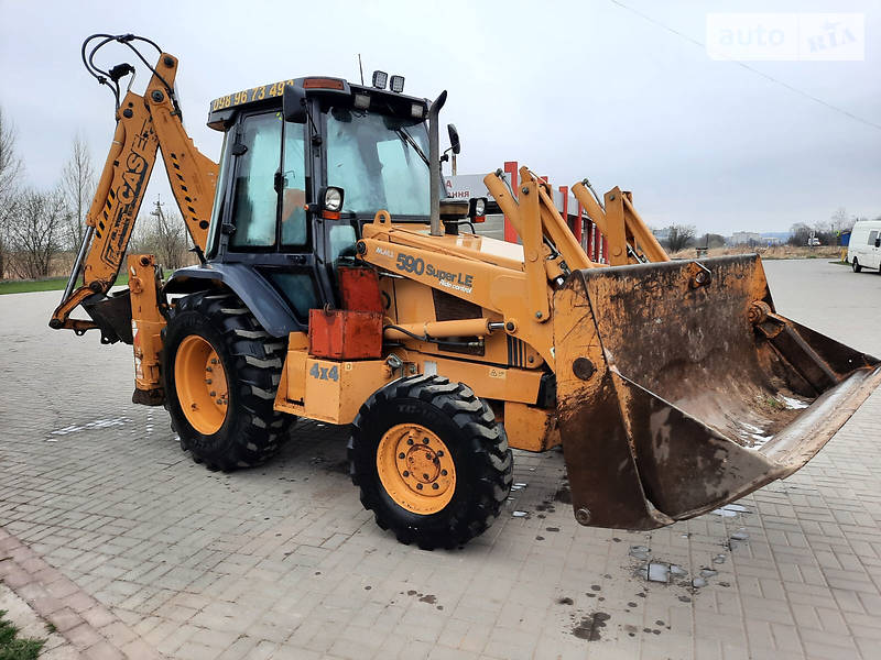 Экскаватор погрузчик Case IH 595 SLE 2001 в 