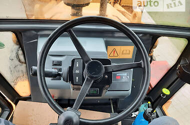 Экскаватор погрузчик Case IH 595 SLE 2001 в 
