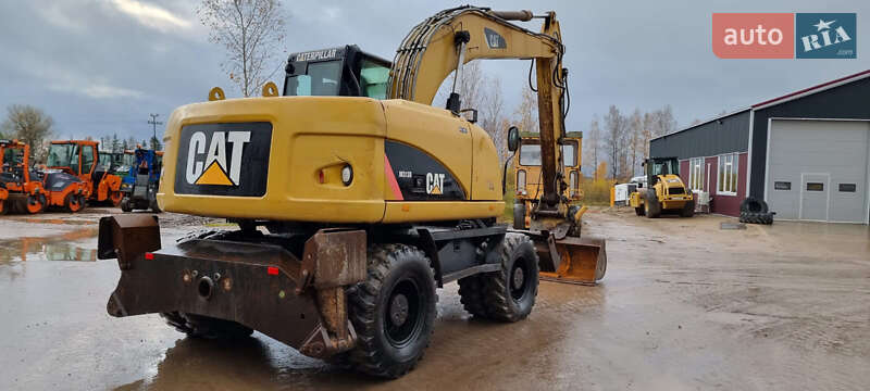 Колесный экскаватор Caterpillar 313 2010 в Одессе