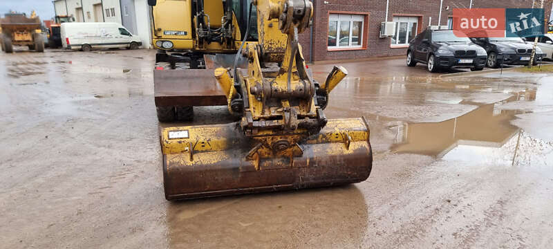 Колесный экскаватор Caterpillar 313 2010 в Одессе