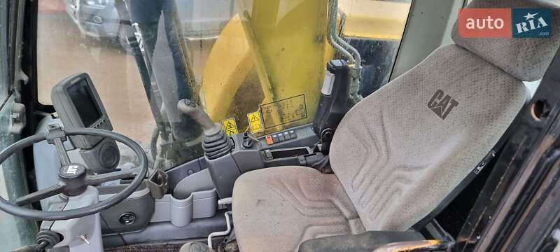 Колесный экскаватор Caterpillar 313 2010 в Одессе