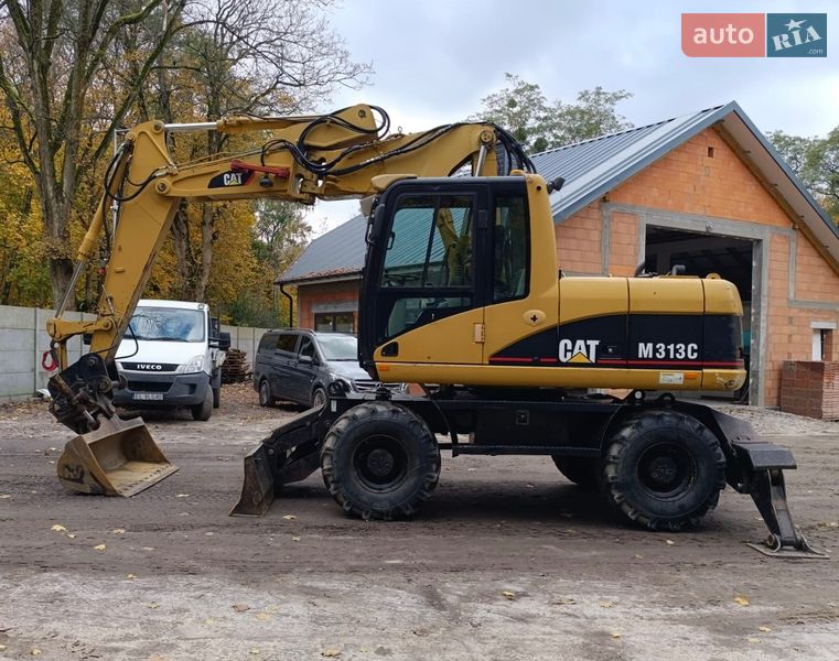 Колесный экскаватор Caterpillar 313 2007 в Львове