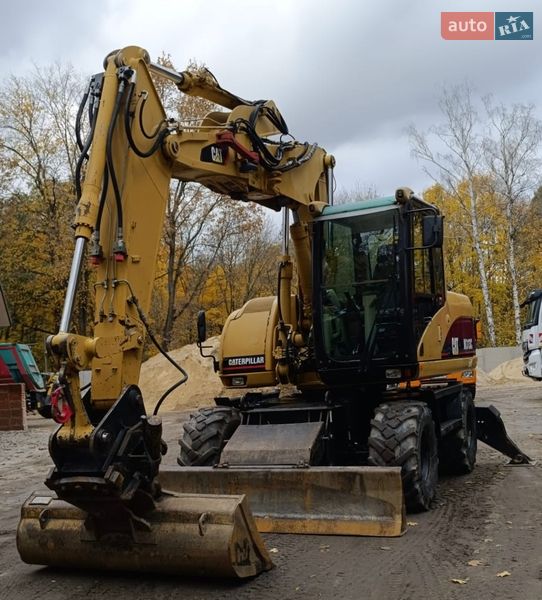 Колесный экскаватор Caterpillar 313 2007 в Львове