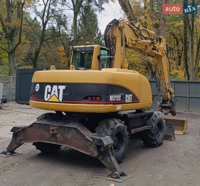 Колесный экскаватор Caterpillar 313 2007 в Львове