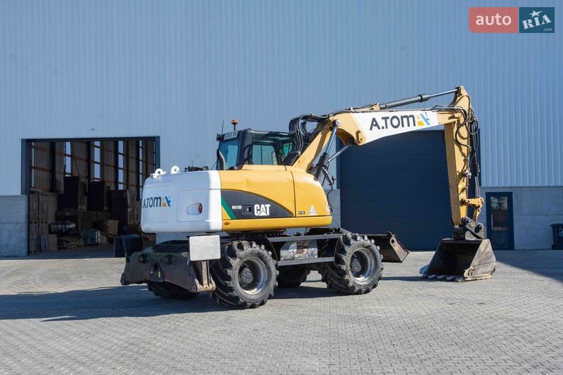 Колісний екскаватор Caterpillar 313 2012 в Житомирі