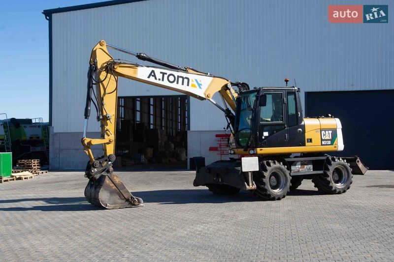 Колісний екскаватор Caterpillar 313 2012 в Житомирі