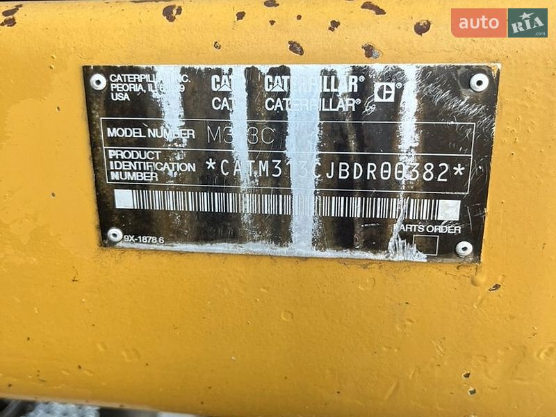 Колесный экскаватор Caterpillar 313 2003 в Косове