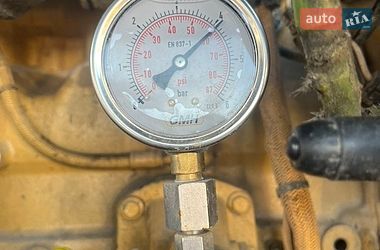 Колесный экскаватор Caterpillar 313 2003 в Косове