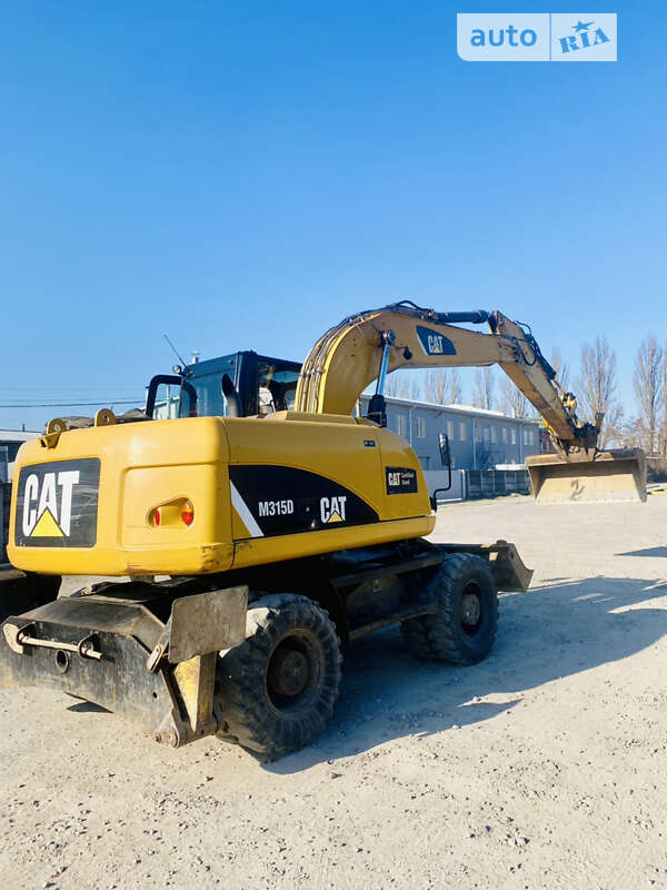 Колісний екскаватор Caterpillar 315 2012 в Вінниці