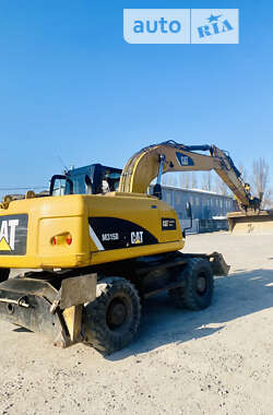 Колесный экскаватор Caterpillar 315 2012 в Виннице