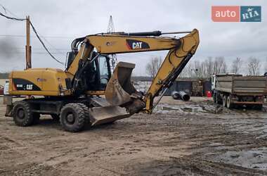 Колісний екскаватор Caterpillar 316 2010 в Львові