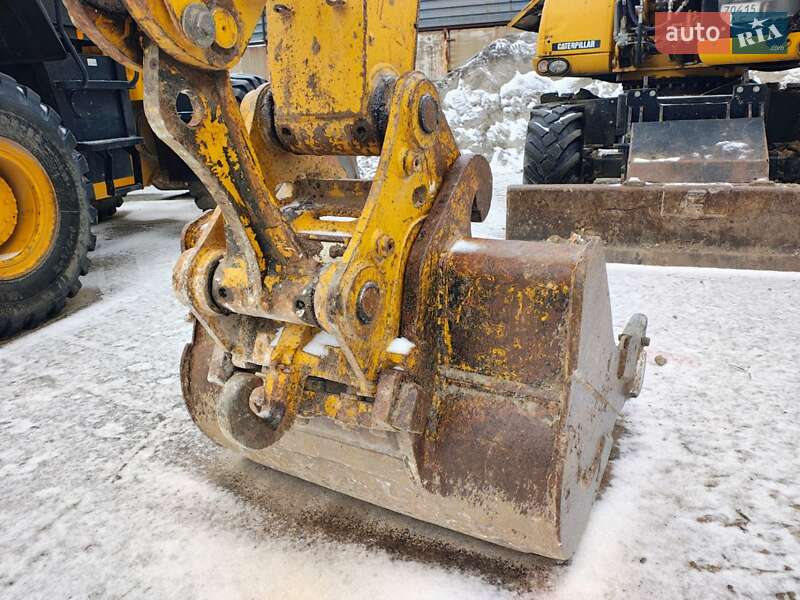 Колесный экскаватор Caterpillar 316 2009 в Николаеве