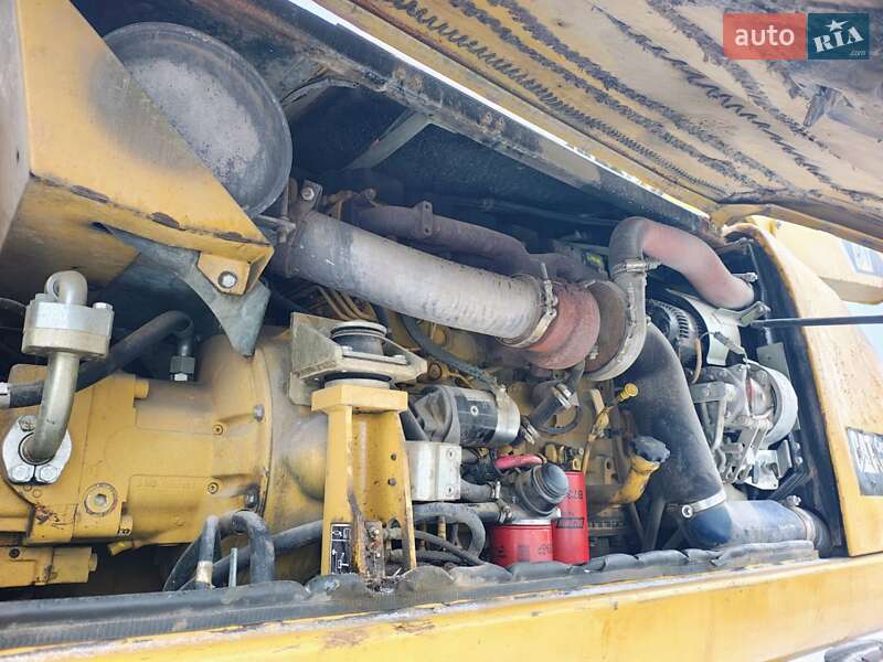 Колесный экскаватор Caterpillar 316 2009 в Николаеве