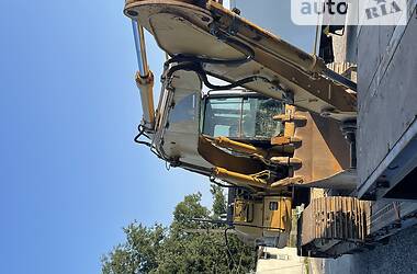 Екскаватор навантажувач Caterpillar 318 2005 в 